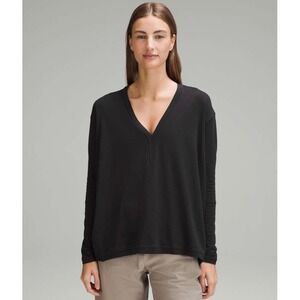 Lululemon Back In Action Black Long Sleeve V Neck Split Hem Pullover Top Women S